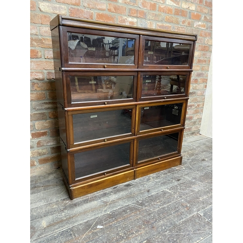 1286 - Good and unusual mahogany twin Globe Wernicke stacking bookcase, four double tiers all with glazed d... 