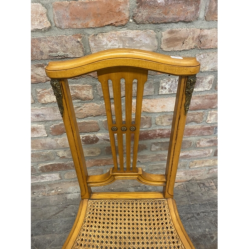 1306 - Pair of French empire satinwood side chairs with bergere seats and ormolu mounts (2).