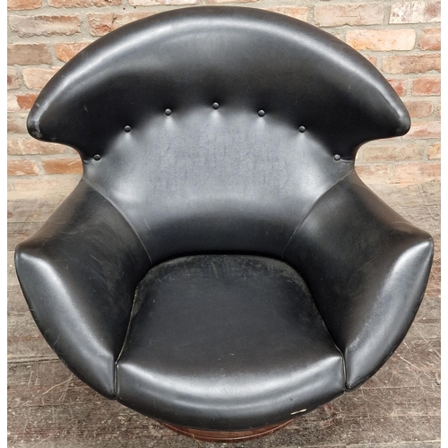 1227 - 1960s Italian swivel lounge chair in egg shape with with cow horn top button back upholstery upon an... 