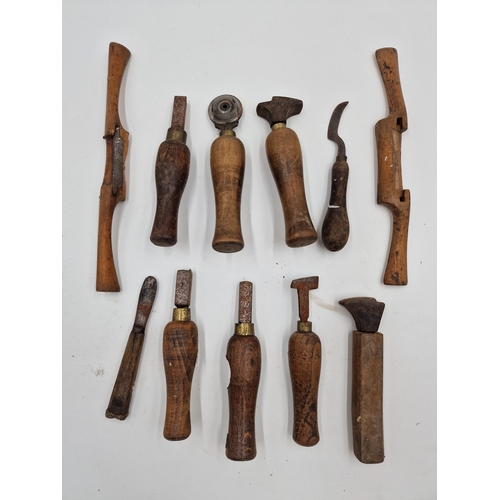 452 - Collection of various cobblers hand tools together with a mixed lot of iron and wooden shoe lathes