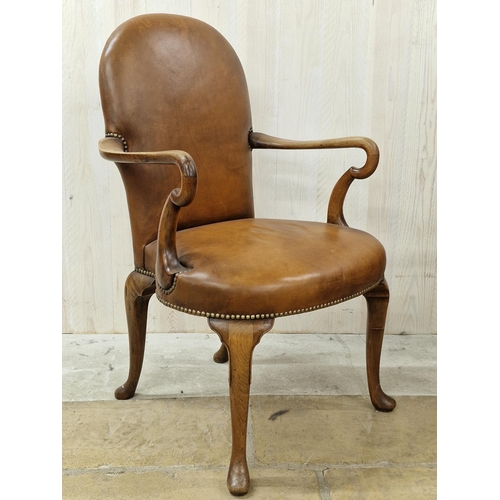 1352 - Good quality Queen Anne style hide leather armchair with scrolled arms and stylised cabriole legs.