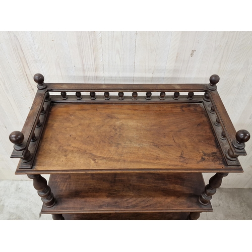 1353 - A Victorian walnut whatnot with raised gallery top rail, 120cm x 60cm.