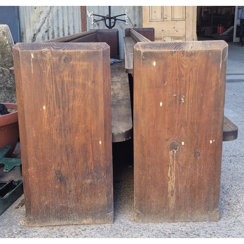 1046 - Pair of antique pitch pine church pews/settles, the panelled backs complete with book shelf, square ... 