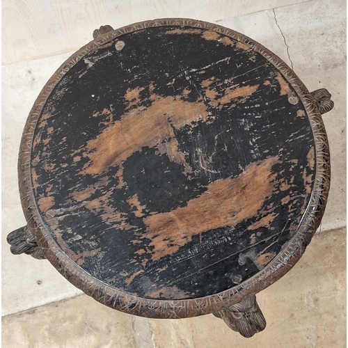 328 - Eastern carved hardwood pot stand or occasional table, the top with darted borders on four mythical ... 