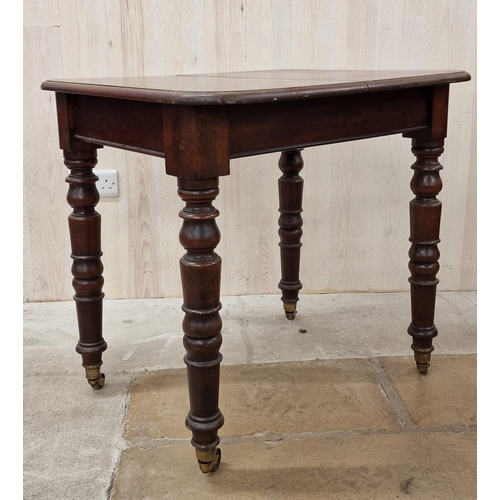 1360 - Unusual small scale Victorian mahogany extending dining table with turned legs, brass castors and tw... 