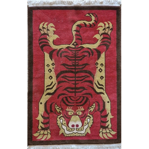 1468 - Novelty full pile wool rug decorated with a tiger on burgundy ground 182 x 120cm