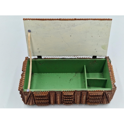 404 - Primitive tramp art box with typical carved geometric decoration, hinged lid enclosing a painted fit... 