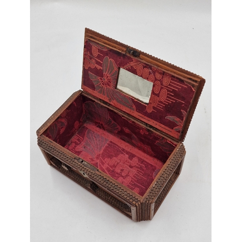 405 - Primitive tramp art casket hinged lid with gilt handle enclosing a paper lined interior with mirror,... 