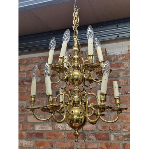 1152 - A Dutch brass two tier twelve branch electrolier, 76 x 65cm