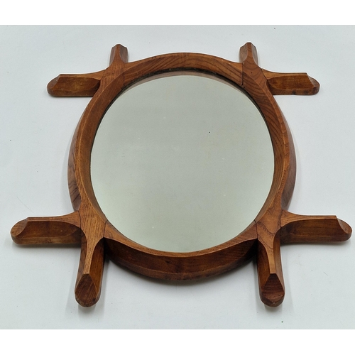 1172 - Arts and Crafts elm oval wall mirror, 59cm x 47cm.