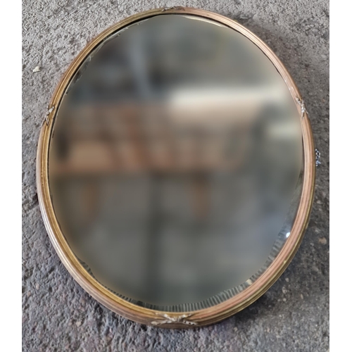 1184 - Regency oval giltwood and gesso wall mirror, original glass plate, 92 x 63cm