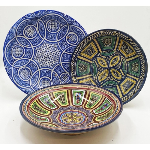 356 - Antique Moroccan fez ware slip glaze pottery charger, 34cm diameter, with two similar chargers (3)