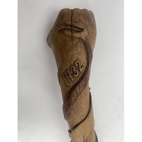 395 - 1930s bespoke hand carved walking stick, a coiled snake trailing up the shaft with panels of various... 