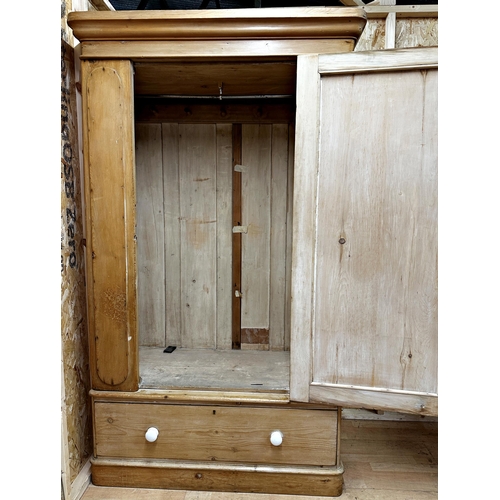 26 - Antique stripped pine wardrobe, 203cm high x 120 cm W x 63cm D