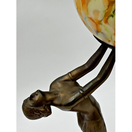 1157 - Exceptional quality Art Deco figural table lamp a mottled glass shade held aloft by two gilt metal l... 