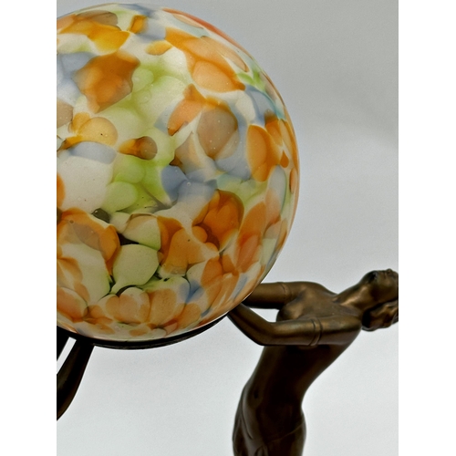 1157 - Exceptional quality Art Deco figural table lamp a mottled glass shade held aloft by two gilt metal l... 