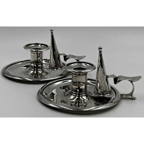 200 - Good pair of Regency silver chambersticks, with snuffers, engraved with three crests, maker Edward B... 