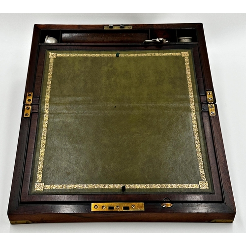 552 - 19th Century writing slope, the hinged lid enclosing a gilt tooled leather fitted interior, 14cm H x... 