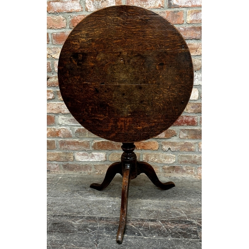 1304 - Antique oak tilt top table on turned tripod base, 70cm high