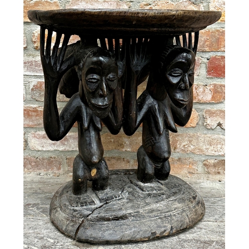 504 - Tribal interest - African caryatid stool, 55cm high