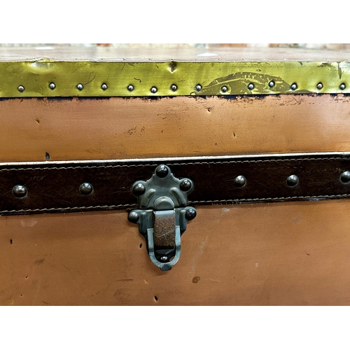 352 - Vintage copper and brass suitcase with studded edges and leather handles, 28 x 64cm