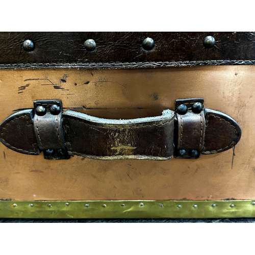 352 - Vintage copper and brass suitcase with studded edges and leather handles, 28 x 64cm