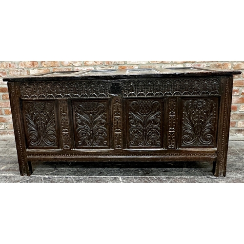 1315 - 18th century panelled oak coffer with four carved floral panels, 76.5 x 159 x 71.5cm