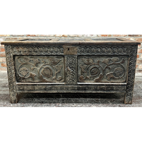 1316 - 18th century oak coffer with two carved floral panels and further carved detail, 65 x 133 x 56cm