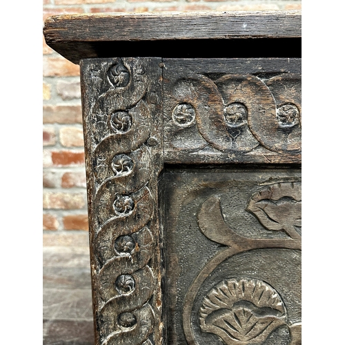 1316 - 18th century oak coffer with two carved floral panels and further carved detail, 65 x 133 x 56cm