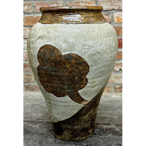 408 - Substantial studio pottery floor vase with incised abstract decoration with celedon highlights upon ... 