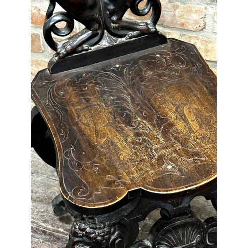 1301 - Good quality 19th century carved walnut Sgabello chair, profusely decorated with mythical beasts and... 