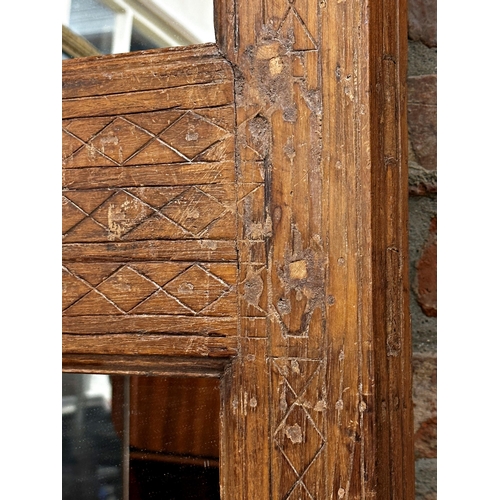 1302 - Eastern hardwood door/mirror with carved detail, 160 x 42cm