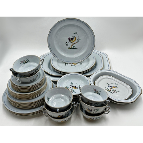 407 - A collection of Spode Queen's Bird pattern dinner wares comprising various dishes, plates, platters ... 