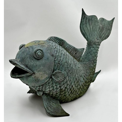 1031 - Patinated cast metal fountain in the form of a fish, 30cm high x 45cm long.