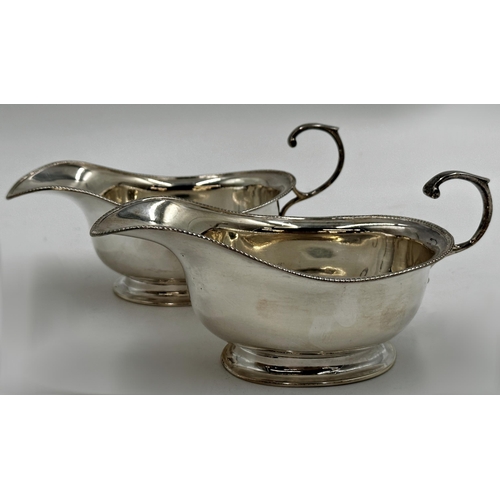 209 - Pair of 1930s silver sauce boats, c-scroll handles and pedestal bases, maker Adie Brothers, Birmingh... 