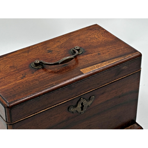 557 - Georgian rosewood tea caddy with brass handle and three-sectional interior, 16cm high x 24cm wide.