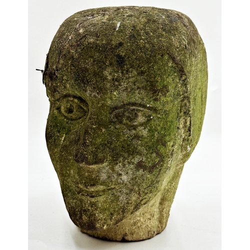 1032 - Antique carved stone head, 27cm high.