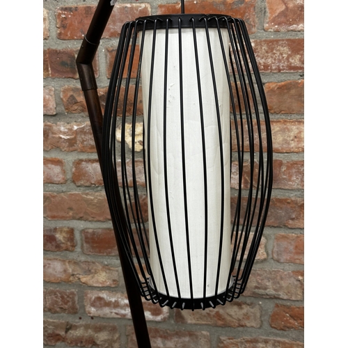 1162 - Good modernist standard lamp upon an angled tubular frame with hanging cage light, 172cm high.