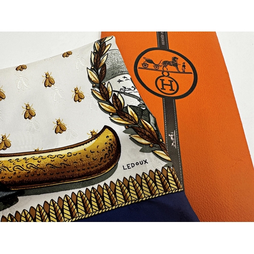 1586 - A Hermès Napoleon “carré” silk scarf 90 designed by Philippe Ledoux.
Featuring iconic designs of imp... 