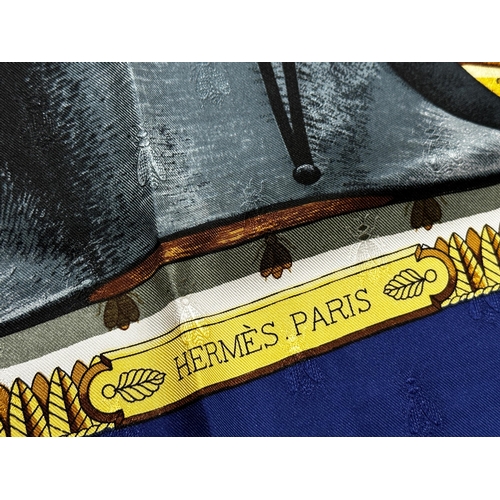 1586 - A Hermès Napoleon “carré” silk scarf 90 designed by Philippe Ledoux.
Featuring iconic designs of imp... 