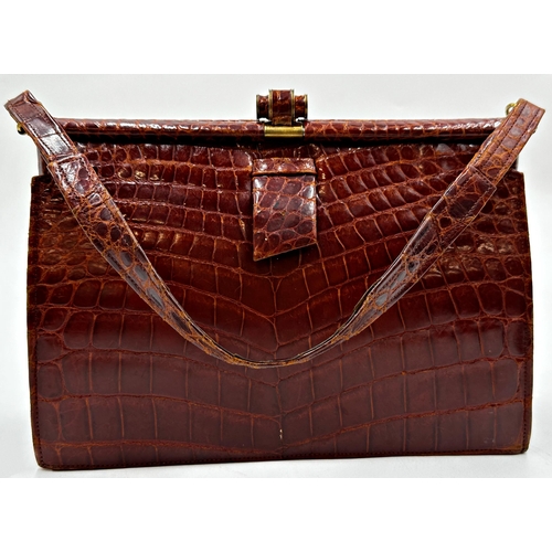 357 - Two vintage handbags comprising brown snakeskin fronted bag by Meadows of Regent Street with gilt me... 