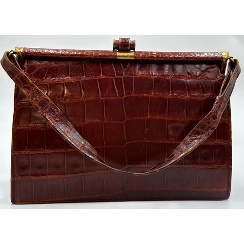 357 - Two vintage handbags comprising brown snakeskin fronted bag by Meadows of Regent Street with gilt me... 