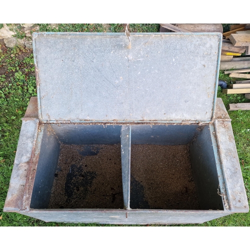 12 - Vintage galvanised feed bin with rivetted edges and rising lid