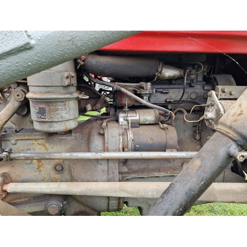 143 - Vintage Massey Ferguson 35X red and grey diesel tractor, starts and drives with working hydraulics, ... 