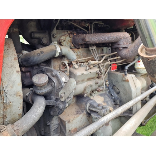 143 - Vintage Massey Ferguson 35X red and grey diesel tractor, starts and drives with working hydraulics, ... 