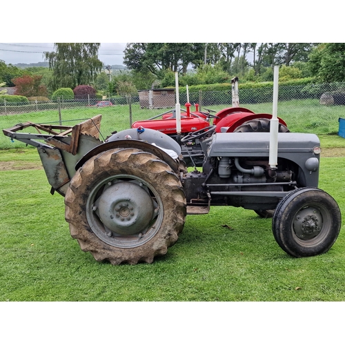 144 - Vintage Ferguson T20 grey diesel tractor, starts and drives, fitted with a working rotary saw, in go... 