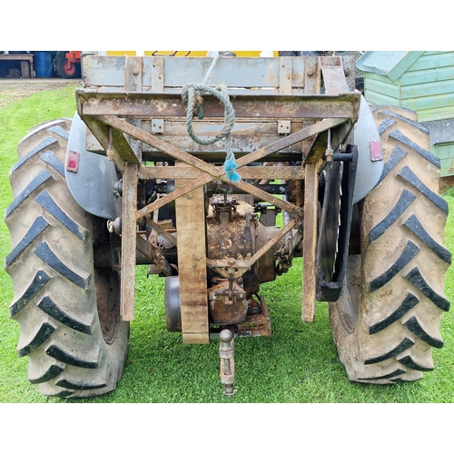 144 - Vintage Ferguson T20 grey diesel tractor, starts and drives, fitted with a working rotary saw, in go... 