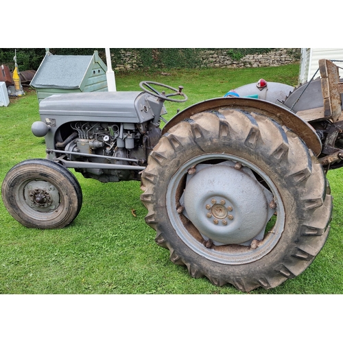 144 - Vintage Ferguson T20 grey diesel tractor, starts and drives, fitted with a working rotary saw, in go... 