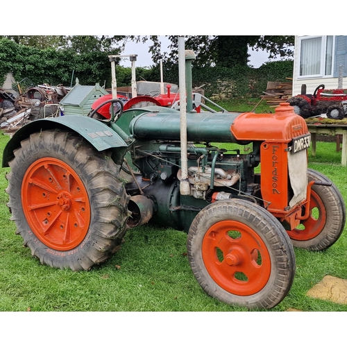 150 - Vintage Fordson Standard green and orange wide wing petrol/TVO powered tractor, starts and drives, r... 