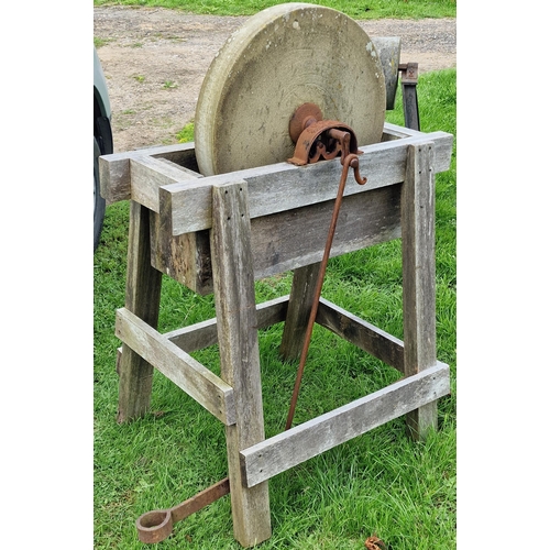 57 - Two vintage grinding wheels on stands (2)